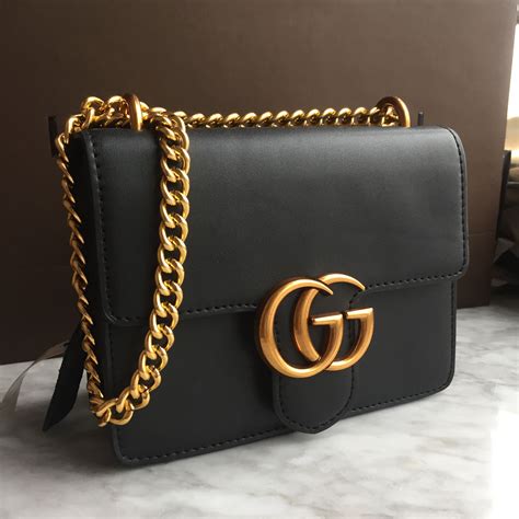 gucci black bag gold chain|gucci chain shoulder handbags.